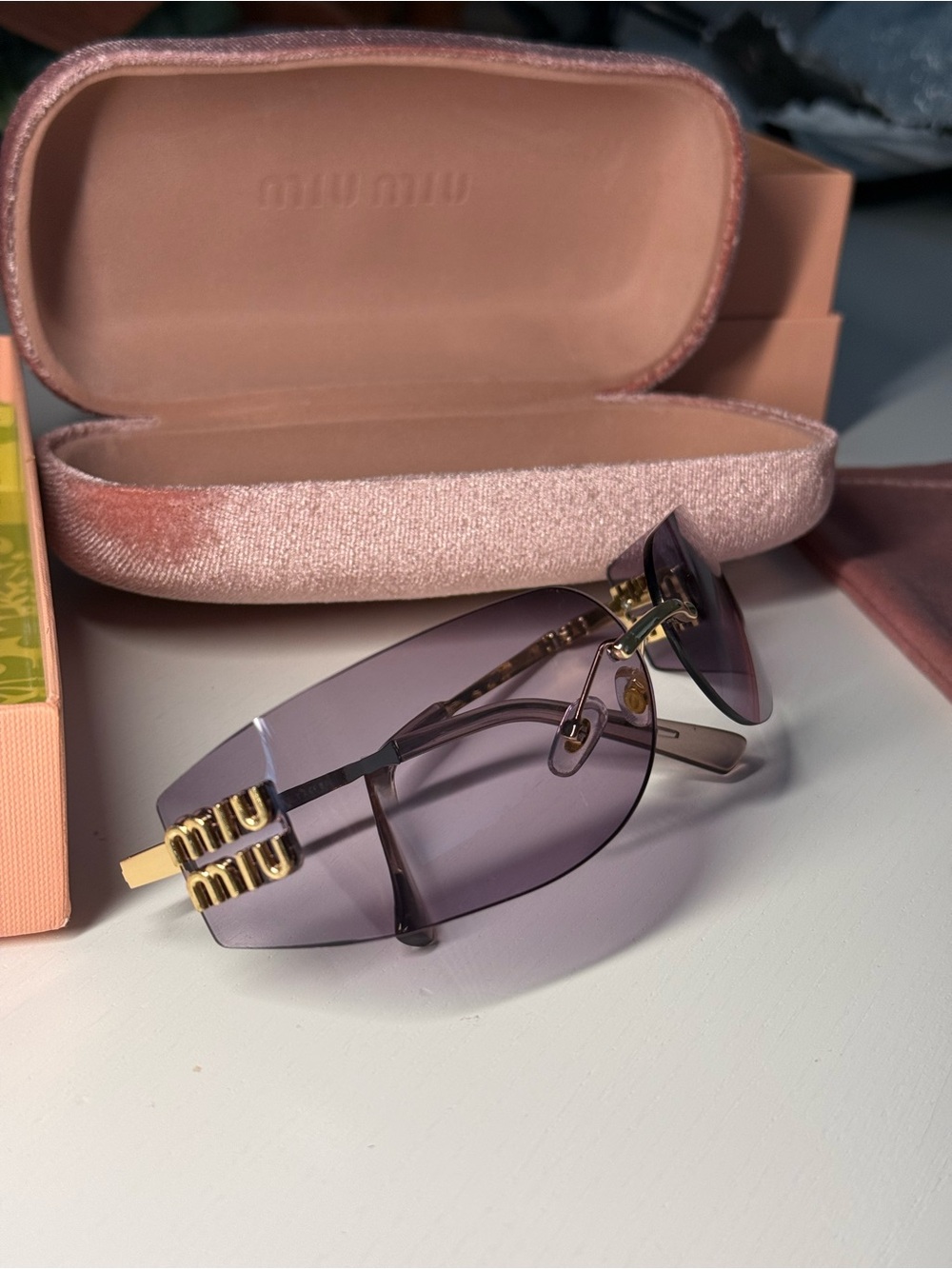 Miu Miu Lilac Rimless Sunglasses with Gold Logo Accent